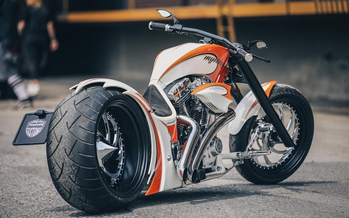 Custom Thunderbike motorcycle with orange and white paint