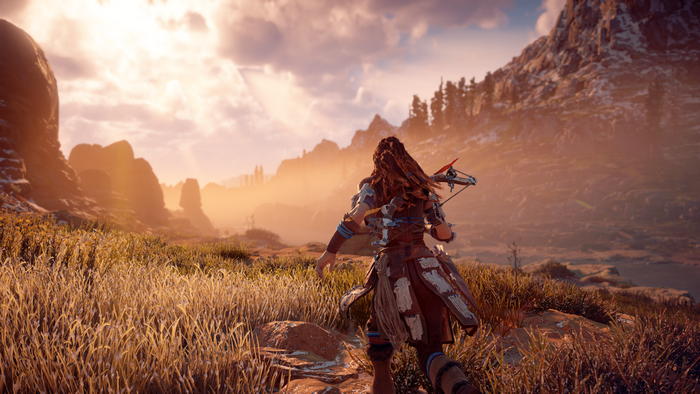 Aloy from Horizon Zero Dawn in a grassy landscape
