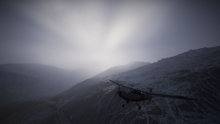Airplane flying over snowy mountains in Ghost Recon Wildlands