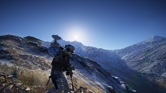 Soldier in Tom Clancy's Ghost Recon Wildlands on snowy mountain