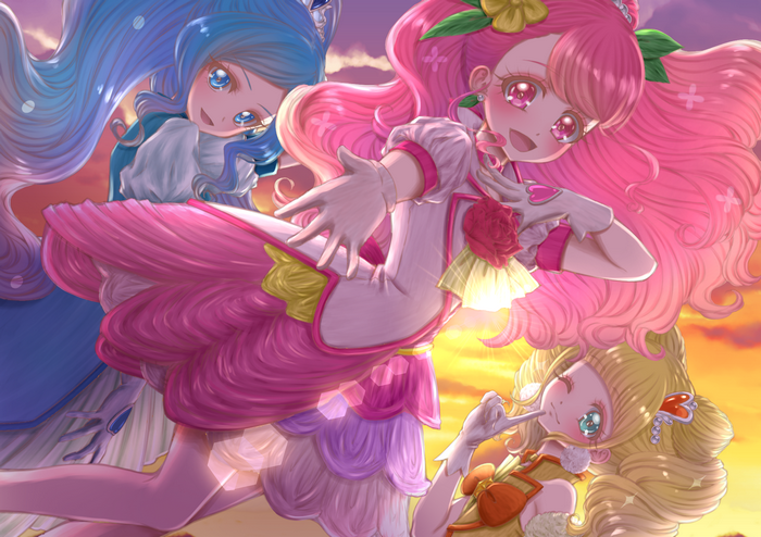 Three Precure girls with blue, pink, and yellow hair