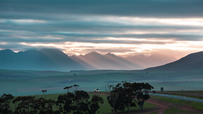 Sun rays over mountains and rolling hills in South Africa