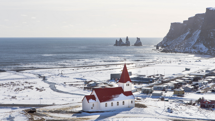 Church in Vik, Iceland with Reynisdrangar sea stacks