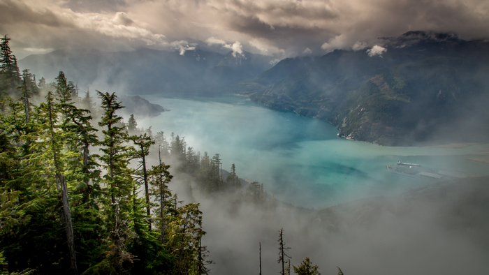 Misty Mountains and Turquoise Lake Landscape