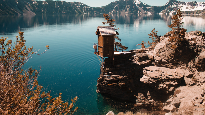 Wooden structure on a cliff overlooking Crater Lake, Oregon