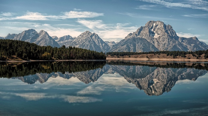 Mountains reflected in a calm lake