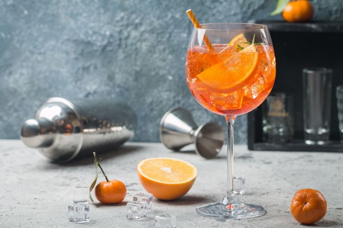 Cocktail with orange slices and ice