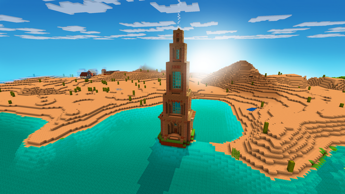 Minecraft desert landscape with a tall tower and lake
