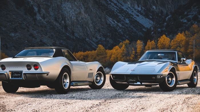 Chevrolet Corvette Stingray cars in fall landscape