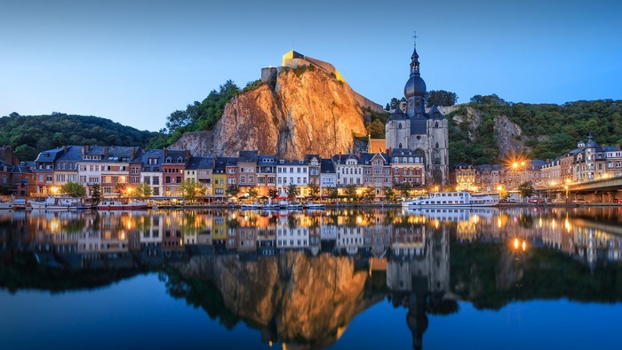 Dinant cityscape with Citadel and river reflection
