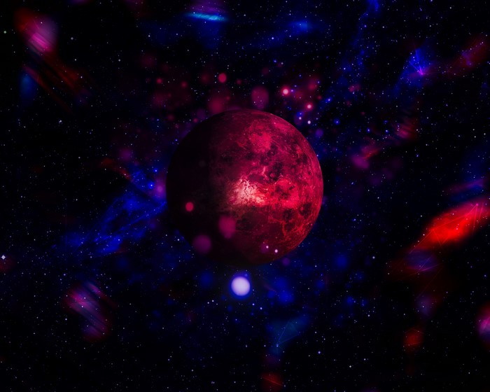 Red planet in a starry nebula