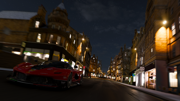 Ferrari driving through Edinburgh at night in Forza Horizon 4