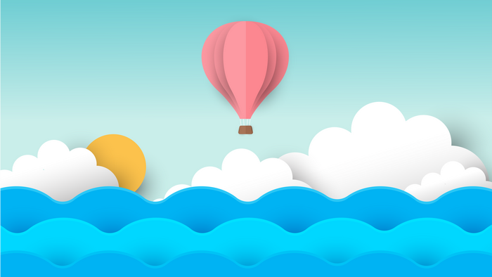 Hot air balloon over the sea with clouds and sun