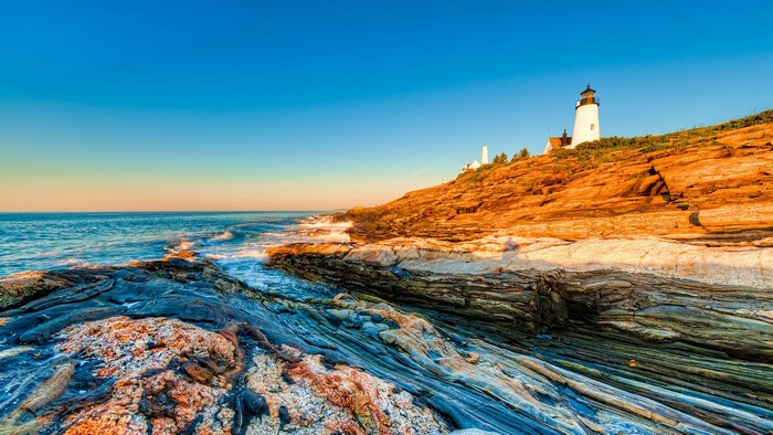 Pemaquid Point Lighthouse on rocky coast, Maine, USA