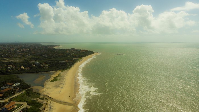 Aerial view of a Brazilian coastline with a beach and ocean