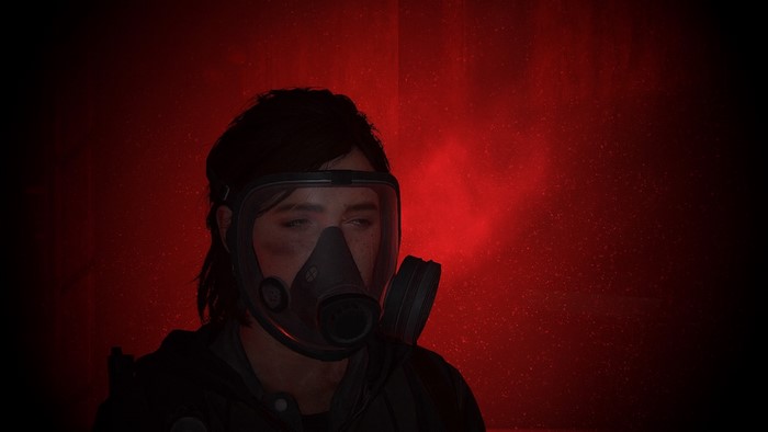 Ellie from The Last of Us Part II wearing a gas mask