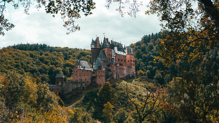 Castle Eltz surrounded by autumn forest