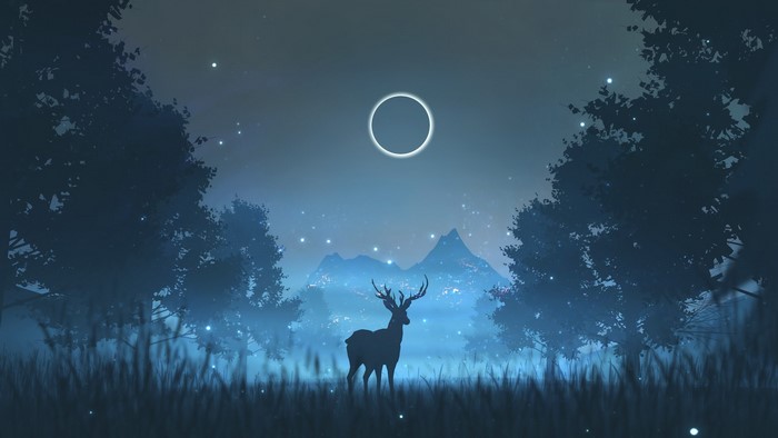 Deer in a forest during a solar eclipse