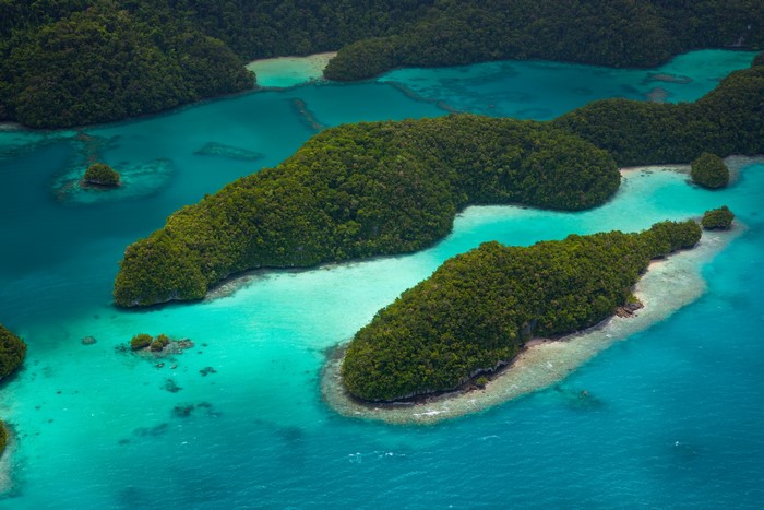 Aerial view of lush green islands in turquoise water