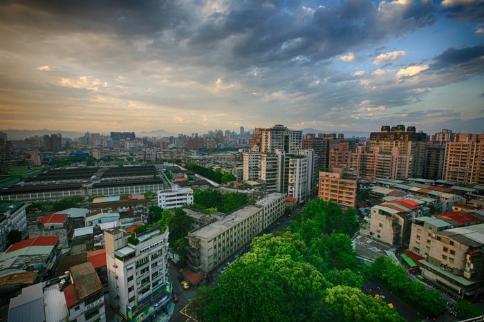 Cityscape of Taipei, Taiwan at sunset with clouds