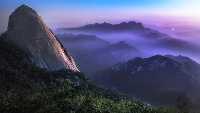 Misty mountains and rock formations at sunrise in South Korea