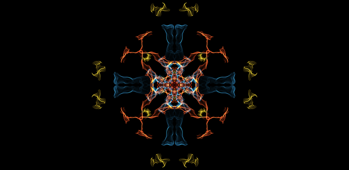 Symmetrical abstract pattern with orange, blue, and yellow silk-like strands