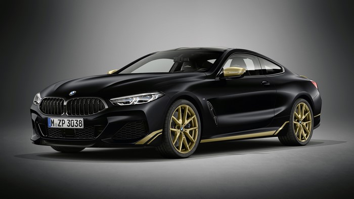 4K Black BMW M850i with Gold Accents