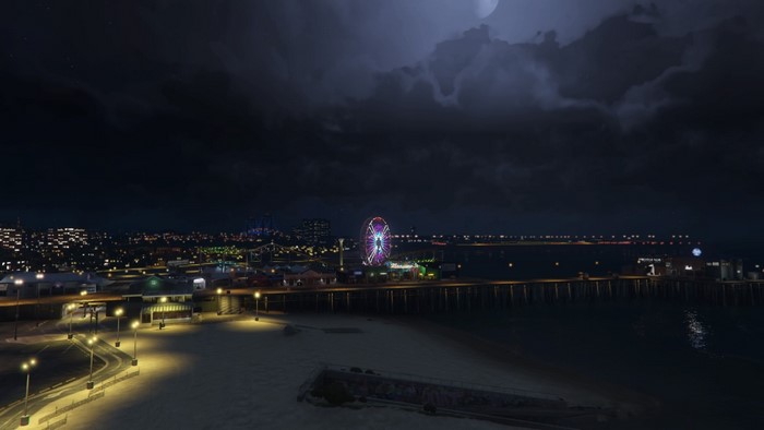 Grand Theft Auto V night scene with Ferris wheel and city lights
