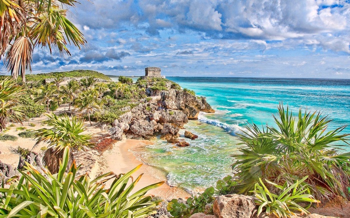 Tulum Ruins on a Rocky Coastline Overlooking the Caribbean Sea