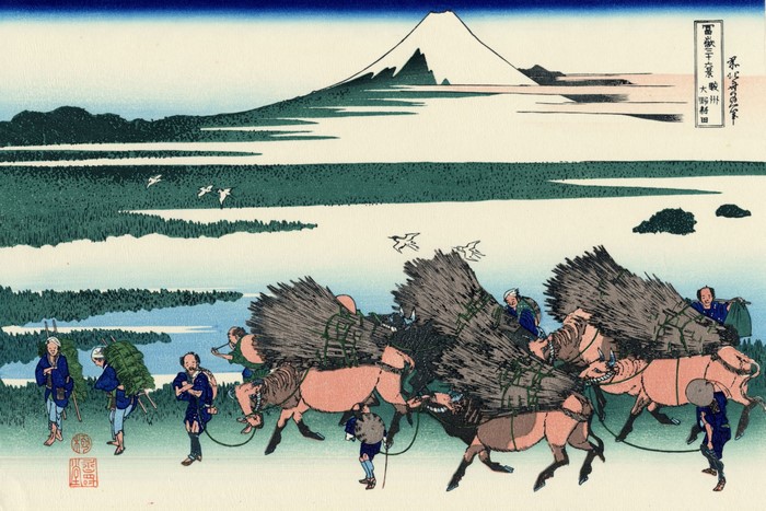 Japanese woodblock print of Mount Fuji with pack animals