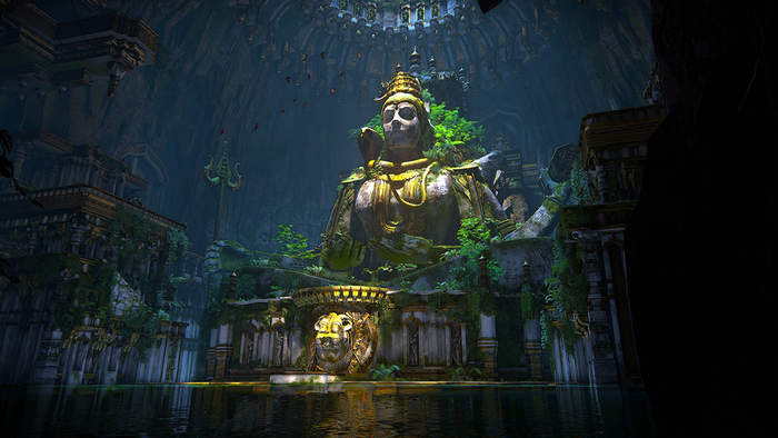 Shiva statue in ancient temple ruins with water