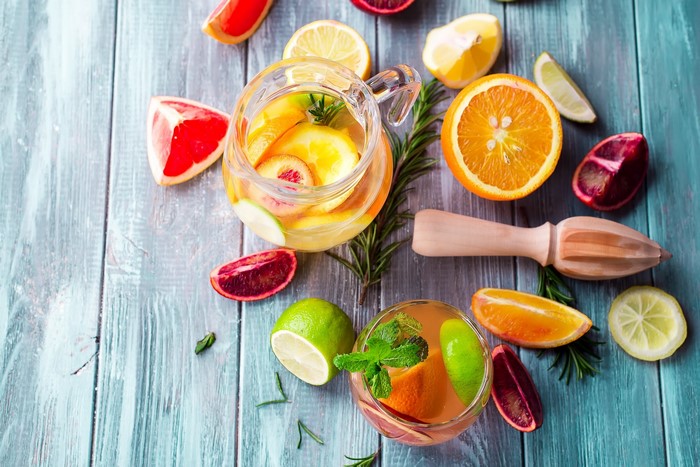 Citrus fruit infused water and pitcher