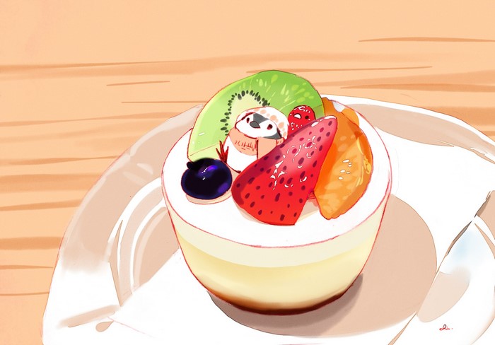 Cute bird on a fruit tart