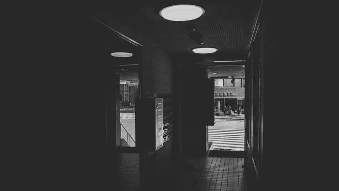 Dark monochrome photography of Tokyo indoors