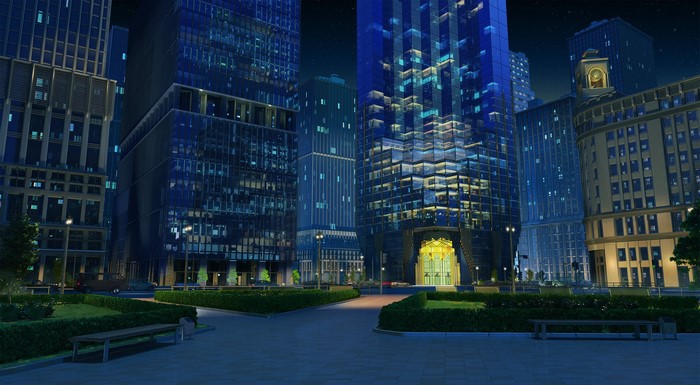 Night cityscape with modern skyscrapers and a park