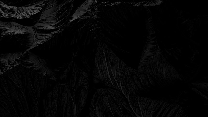 Dark abstract texture with flowing lines