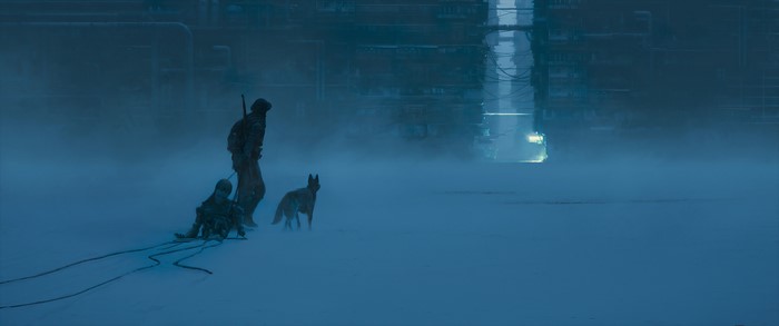 Hunter and child with dog in snowy industrial area