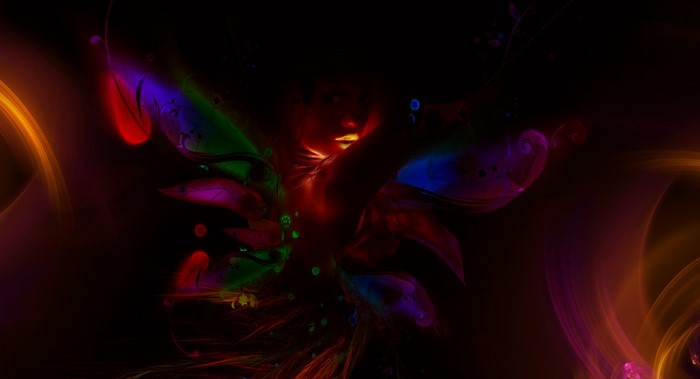 Fairy with colorful wings on black background