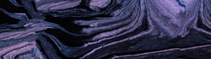 Abstract purple and black marbled texture