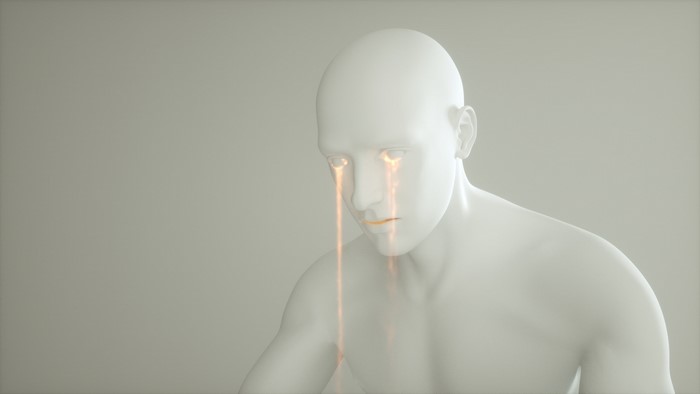White sculpture crying orange tears