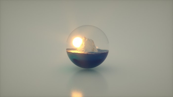 Iceberg in a glass sphere with sun and ocean