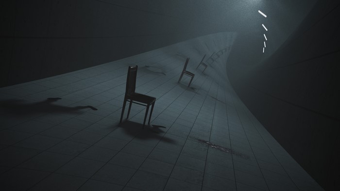 Chairs and shadows in a dark, curved hallway