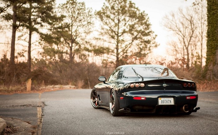 Mazda RX-7 FD parked on a road with trees