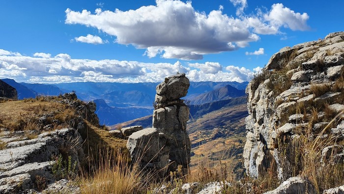 Rocky outcrop overlooking a valley in Peru