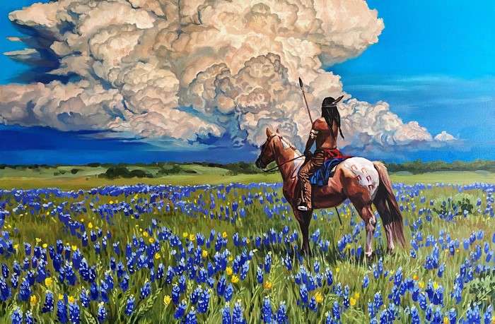 Native American on horseback in a field of bluebonnets