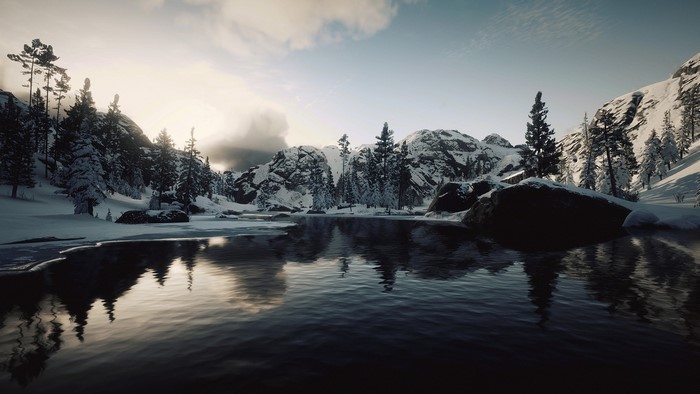 Winter landscape with lake and mountains in Red Dead Redemption 2