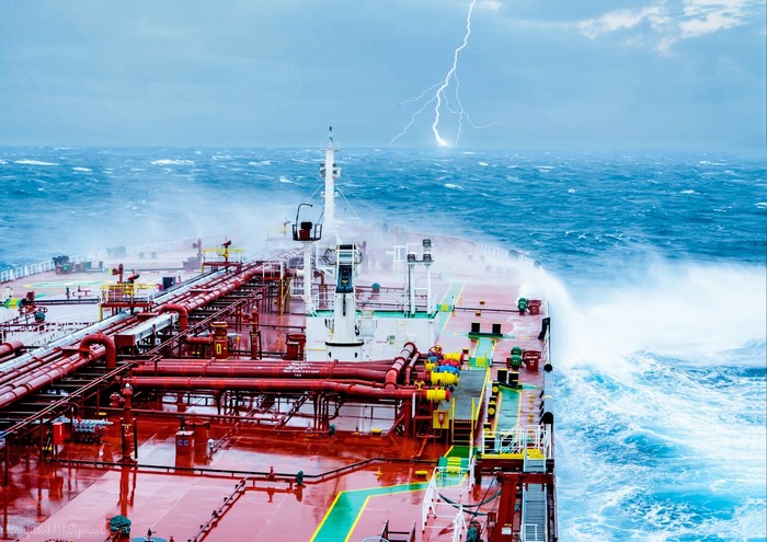 Oil tanker in a storm with lightning