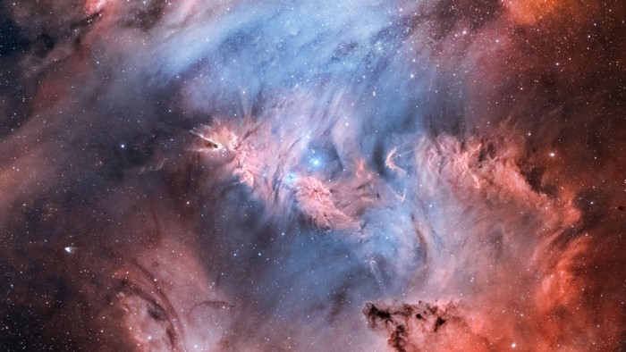 Colorful Nebula with Stars and Dust Clouds