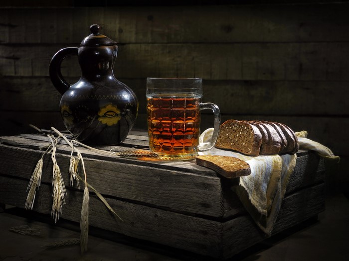 Still life with beer, bread, and pitcher