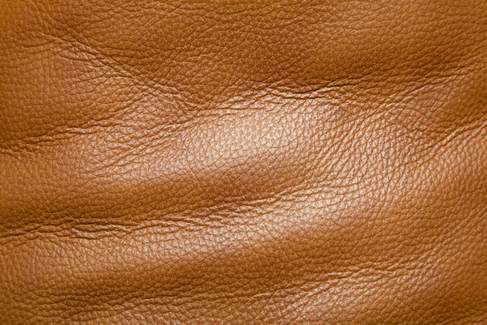 Brown leather texture with wrinkles
